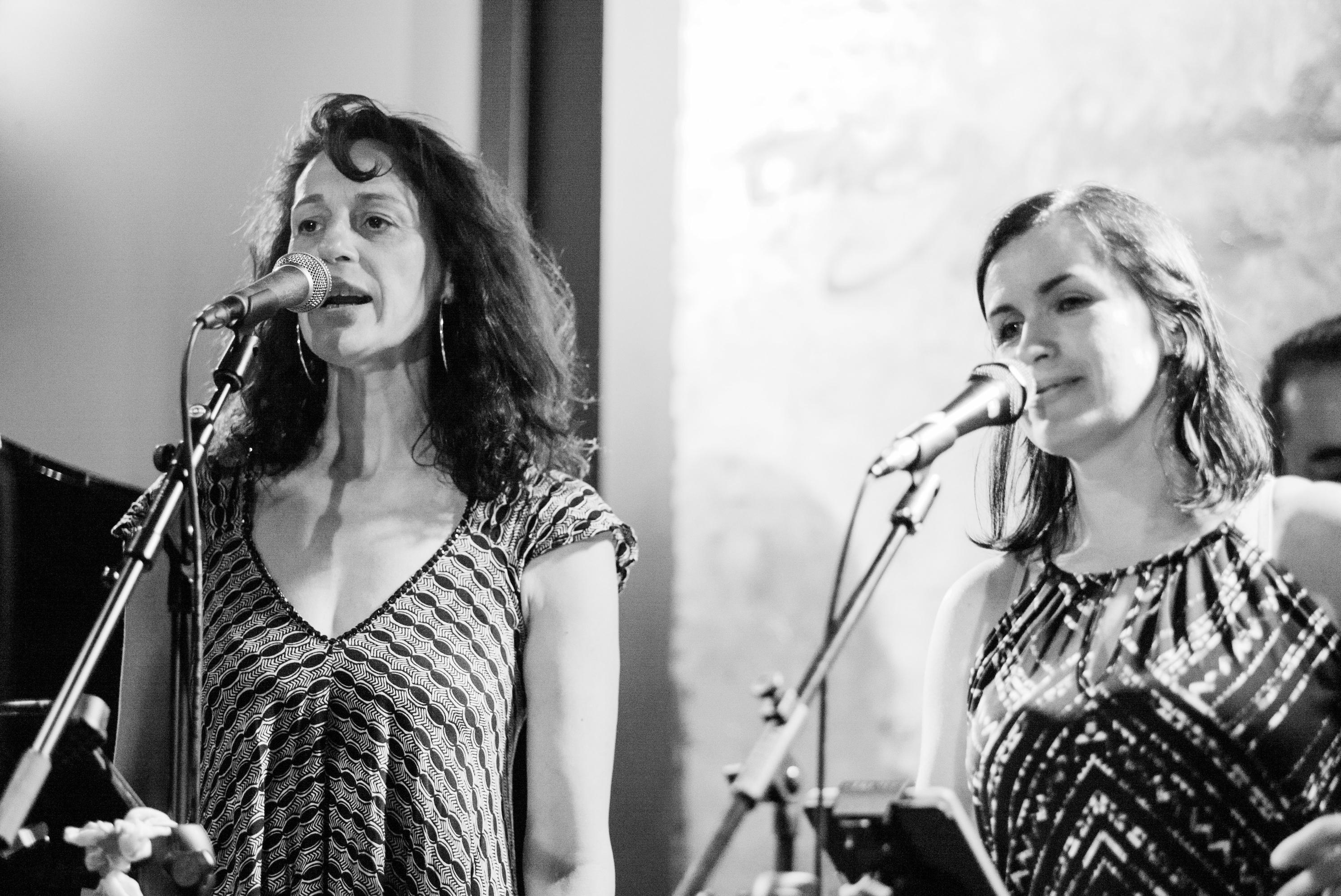 Two vocalists and band